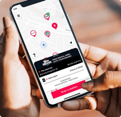 New advertising model in the Brick app, showing sponsored powerbank stations and ads to users.